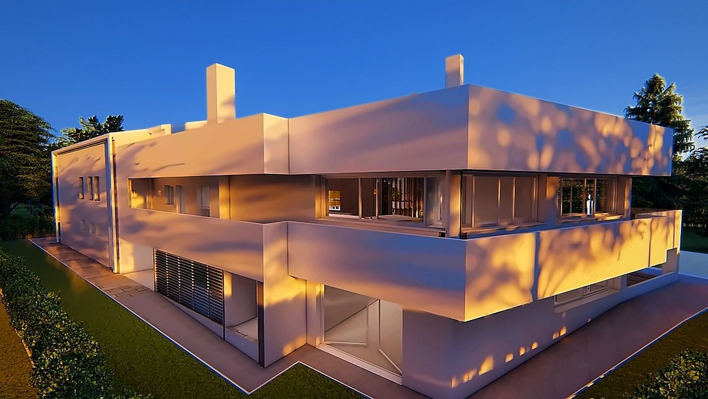 The volume at sunset, with the shadows of the trees on the façade